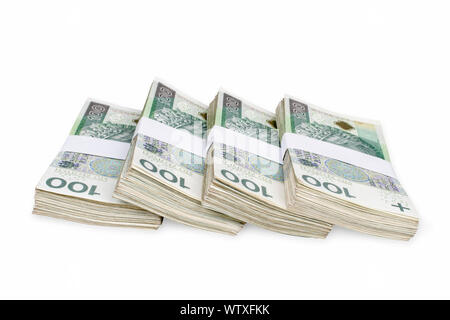 Bundles of polish 100 zloty banknotes. Isolated on white. Clipping path included. Stock Photo