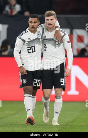 Gelsenkirchen, Deutschland. 12th Sep, 2019. Preview of the Bundesliga top match RB Leipzig-FC Bayern Munich. Archive photo: Serge GNABRY (left, GER) is pleased with goalkeeper Timo WERNER (GER) over the goal to 1: 0 for Germany, jubilation, cheering, cheering, joy, cheers, celebrate, goaljubel, whole figure, portrait, football Laenderspiel, Nations League, Germany (GER) - Netherlands (NED) 2: 2, on 19/11/2018 in Gelsenkirchen/Germany. å | usage worldwide Credit: dpa/Alamy Live News Stock Photo