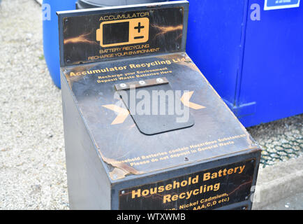 recycling deposit container for used household batteries at council recycling site united kingdom Stock Photo
