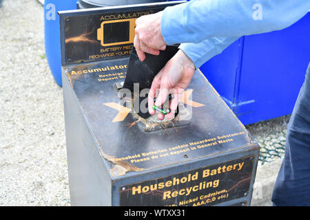 recycling deposit container for used household batteries at council recycling site united kingdom Stock Photo