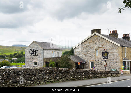 Pen-y-ghent cafe in the village of Horton-in-Ribblesdale, North Yorkshire. The cafe is a popular starting point for 'Three Peaks' walkers. Stock Photo