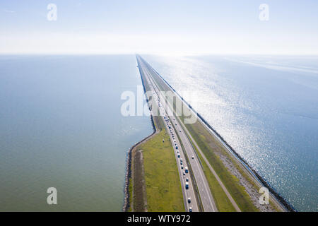 Afsluitdijk, a major dam and causeway in the Netherlands, runs from Den Oever in North Holland to village of Zurich in Friesland province, damming off Stock Photo