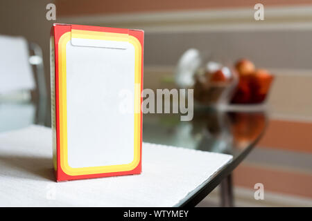 Baking soda in a paper box. Branded packaging of soda in the kitchen Stock Photo