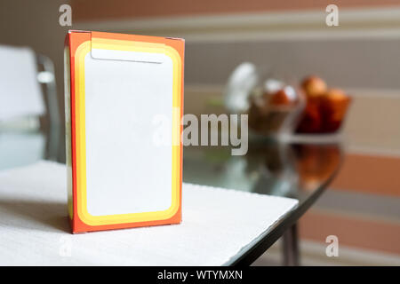 Baking soda in a paper box. Branded packaging of soda in the kitchen Stock Photo