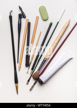 Various art tools on white background Stock Photo