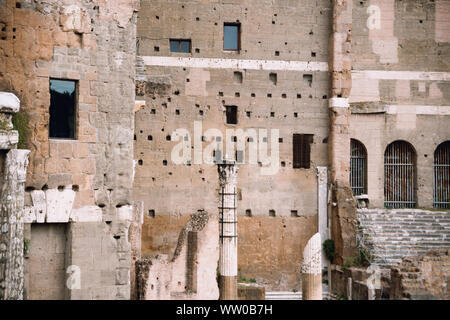 Close up wall and windows view of ancient Rome building, Italy Stock Photo