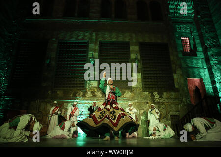 Cairo, Egypt. 11th Sep, 2019. Dancers perform during EL Tanoura show, an Egyptian traditional Sufi dance, at Qubbet Al-Ghouri. Credit: Lobna Tarek/dpa/Alamy Live News Stock Photo