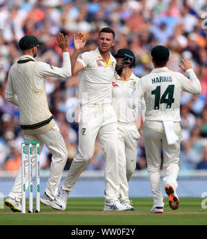 Australia's Josh Hazlewood celebrates the wicket of England's Rory Burns before the decision is overturned on review during day one of the fifth test match at The Oval, London. Stock Photo