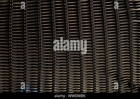 Brown rattan pattern texture on a chair. Stock Photo