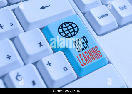 Word writing text Deep Learning. Business photo showcasing Hierarchical Abstractions Artificial Intelligence Algorithm White pc keyboard with empty no Stock Photo
