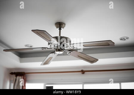 Picture of electric ceiling fan inside the living room Stock Photo - Alamy