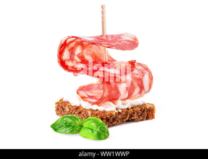 One canapes with salami, ricotta and bread  isolated on a white background Stock Photo