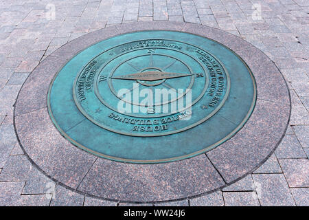 A compass lists the directions to nearby landmarks on Capitol Hill in Washington DC Stock Photo