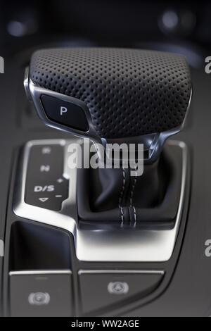 Russia, Izhevsk - April 4, 2019: Audi showroom. New A4 Quattro with automatic transmission in dealer showroom. Famous world brand. Modern transportati Stock Photo