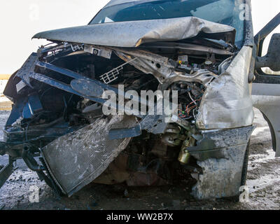 Murmansk, Russia - April 04, 2019: The front part of the car, completely broken in an accident Stock Photo
