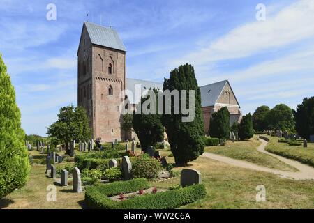 Frisian's chathedral St. Johannis in Nieblum on the island Föhr surrounded by a big cemetery, 29 July 2018 | usage worldwide Stock Photo