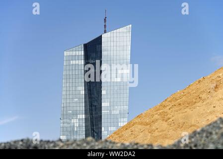 View from the Osthafen to the European Central Bank (ECB) in Frankfurt with sand and crushed rock dump in the foreground. | usage worldwide Stock Photo