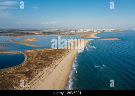 Aerial view of beautiful Meia Praia beach near tourist town Lagos, Algarve, Portugal at summer Stock Photo