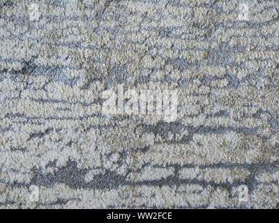 Stained pattern of a synthetic carpet Stock Photo