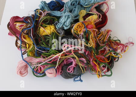 Different color woolen thread entangled with each other Stock Photo