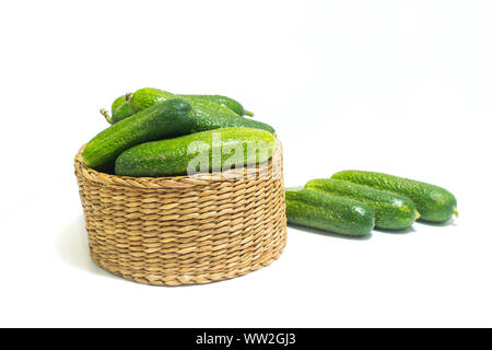 Fresh , green cucumbers in box isolated on white background. Stock Photo
