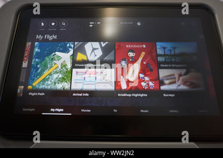 HONG KONG - CIRCA APRIL, 2019: seat back screen in economy class on Singapore Airplines Airbus A350. Stock Photo