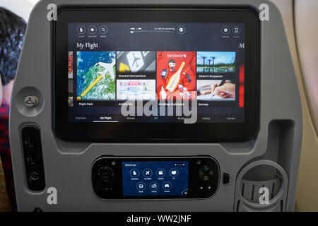 HONG KONG - CIRCA APRIL, 2019: seat back screen in economy class on Singapore Airplines Airbus A350. Stock Photo