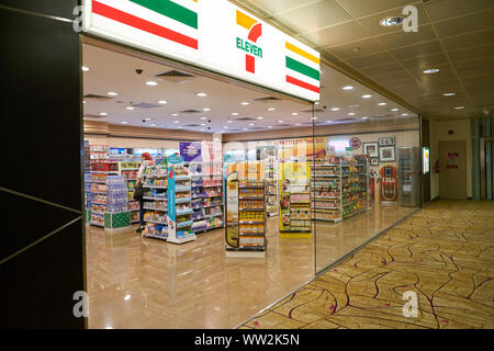 SINGAPORE - CIRCA APRIL, 2019: entrance to 7-Eleven at Changi International Airport. Stock Photo