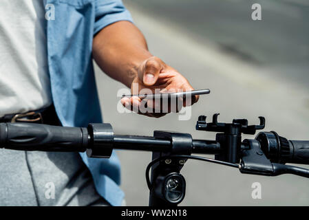 Young man using smart phone Stock Photo
