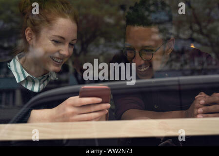 Couple using smart phone Stock Photo