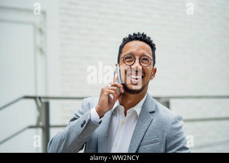Businessman talking on smart phone Stock Photo
