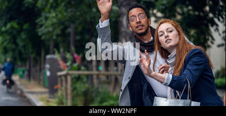 Couple waiting for taxi Stock Photo