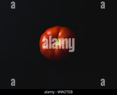 Fresh , red tomatoe on dark black background.Healthy food concept. Stock Photo