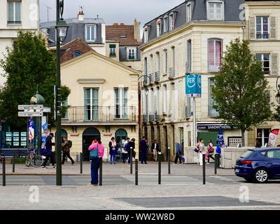 People on the street near the RER train station entrance, Saint-Germain-en-Laye, France Stock Photo