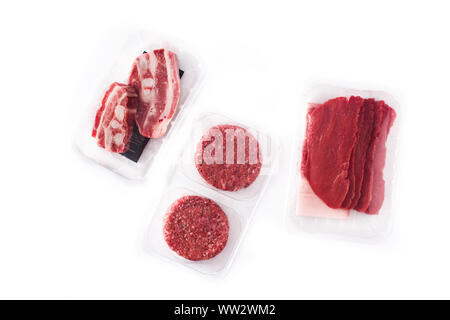 Different types of meat packaged in plastic isolated on white background Stock Photo