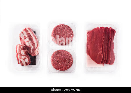 Different types of meat packaged in plastic isolated on white background Stock Photo
