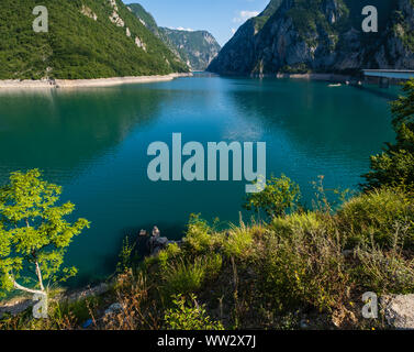 The famous Piva river canyon with its fantastic reservoir Piva Lake (Pivsko Jezero) summer view in Montenegro. Nature travel background. Stock Photo