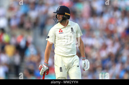 England's Chris Woakes walks off after being dismissed during day one of the fifth test match at The Oval, London. Stock Photo