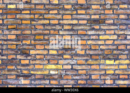 Old multi-colored brick wall. Natural background for designers. Stock Photo