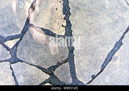 Old, damaged by time, stone wall. Natural background for designers. Stock Photo