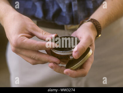 tobacco product placed under the lip Snus-snuff- Tobacco products prepared before to be placed up under upper lip  for extended periods and is illegal in EU Stock Photo