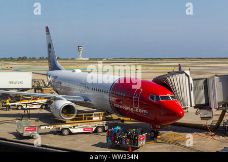 Boeing 737-800 airplane in the airport of Barcelona, from Norwegian low cost company Stock Photo