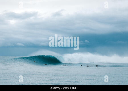 Heavy wave breaking before the storm in Mentawai Islands Stock Photo