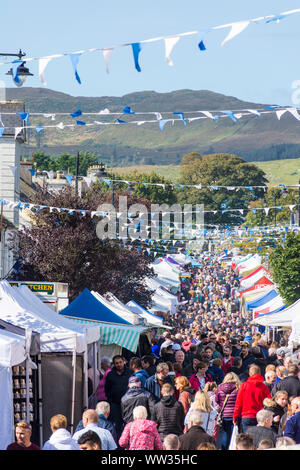 Glenties, County Donegal, Ireland. 12th September 2019. Crowds walk the main street in the small town during the annual Harvest Fair. The fair is the biggest of it's kind in Ireland and the main N56 road through the town is closed for the day with diversions in place. Stock Photo