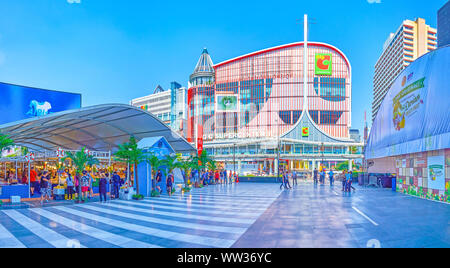 BANGKOK, THAILAND - APRIL 24, 2019: The small square among large department stores in the heart of modern Ratchaprasong shopping area, on April 24 in