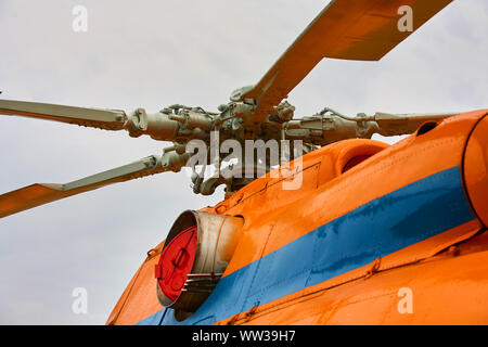 The propeller of the helicopter close-up against a gray sky. Stock Photo