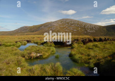 Wet and boggy peat moorland on Bleaklow near Glossop in Derbyshire ...