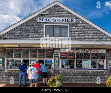 Mac's on the Pier offers fresh seafood at Wellfleet Harbor, Cape Cod, Massachusetts, USA. Stock Photo