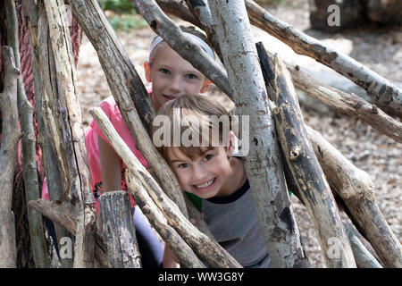 kids playing in a lean to Stock Photo