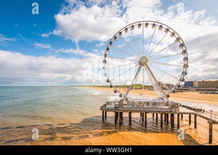Ferris wheel on the beach of Scheveningen, North Sea, The Netherlands. Stock Photo